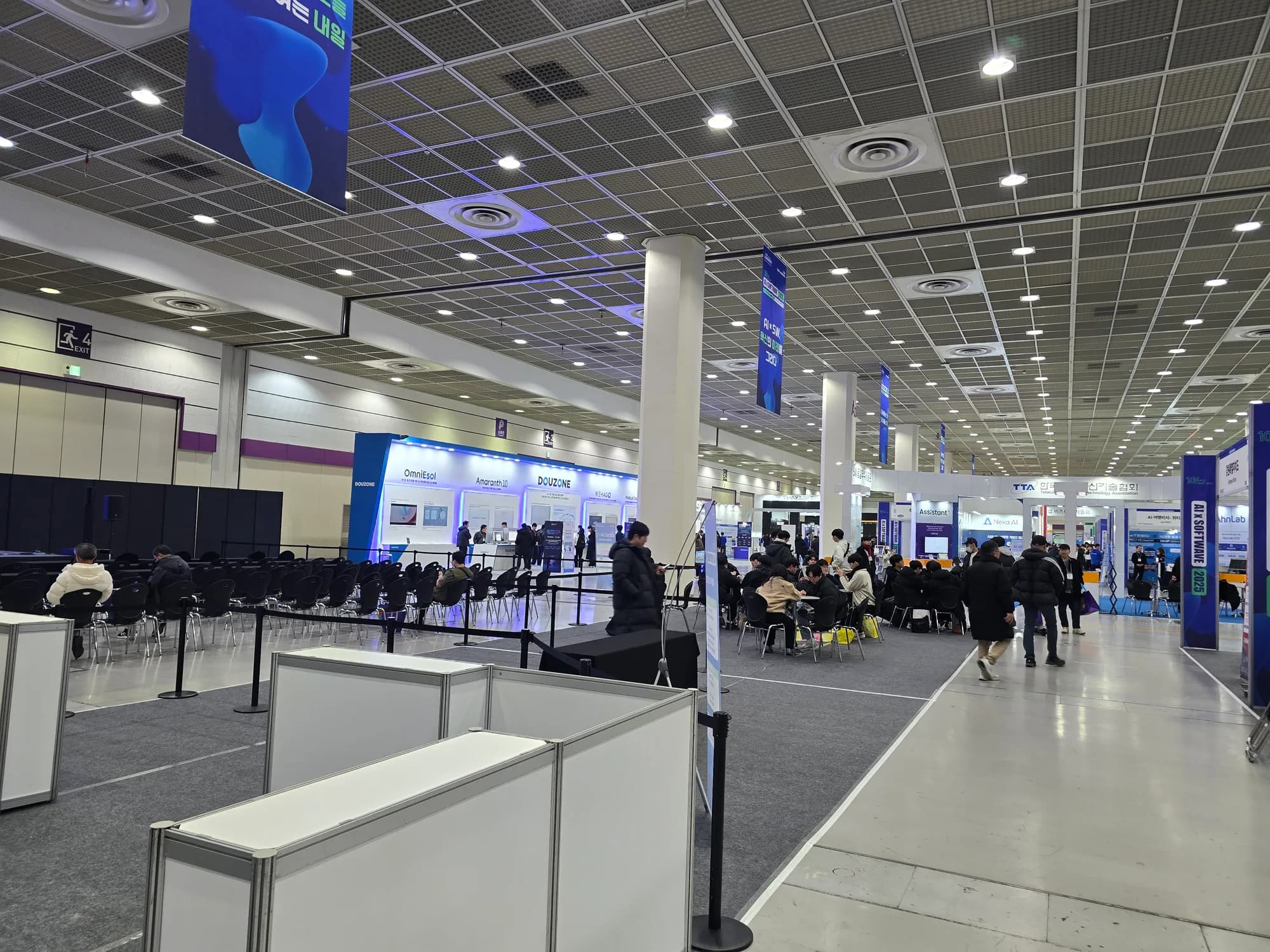 Visitors and exhibition booths inside COEX A Hall